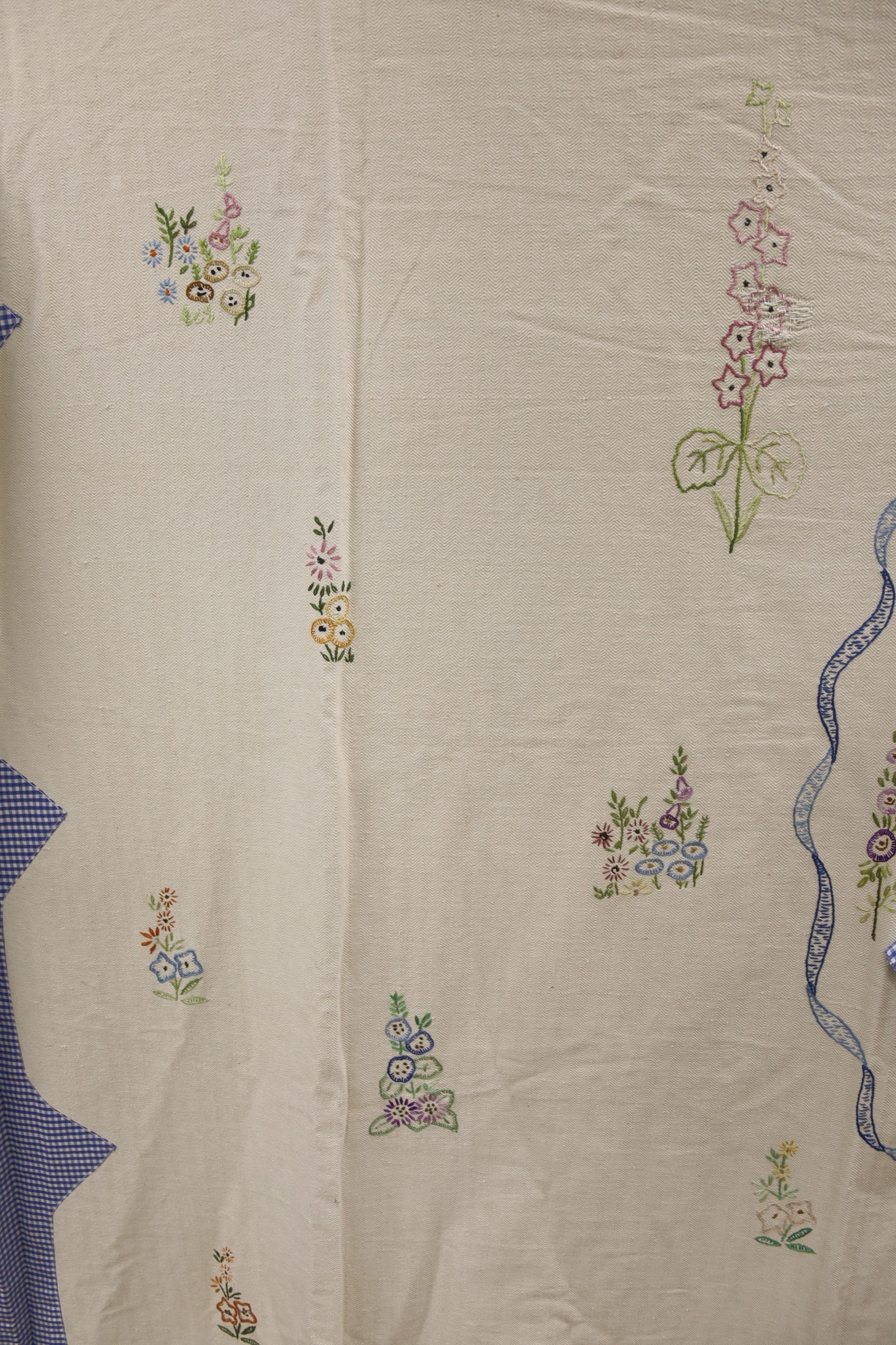 Two embroidered and appliquéd bed covers designed with ladies wearing crinoline dresses